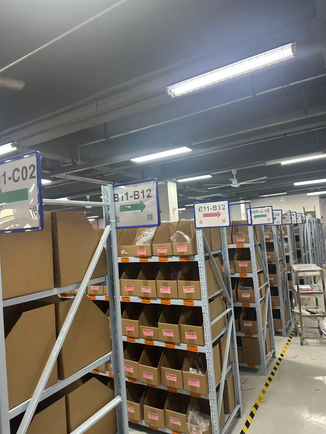 Stock storage shelves with aisle markers
